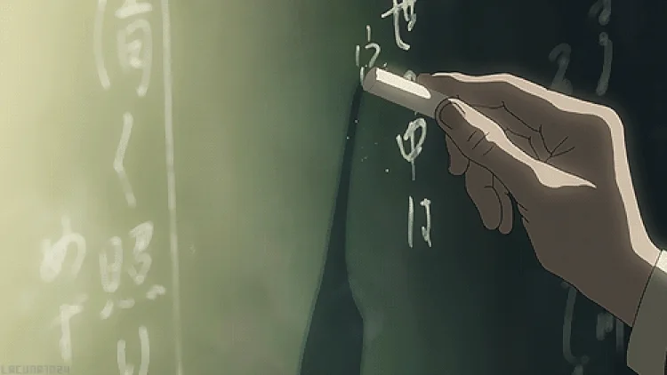 Main écrivant à la craie sur un tableau noir (animation)